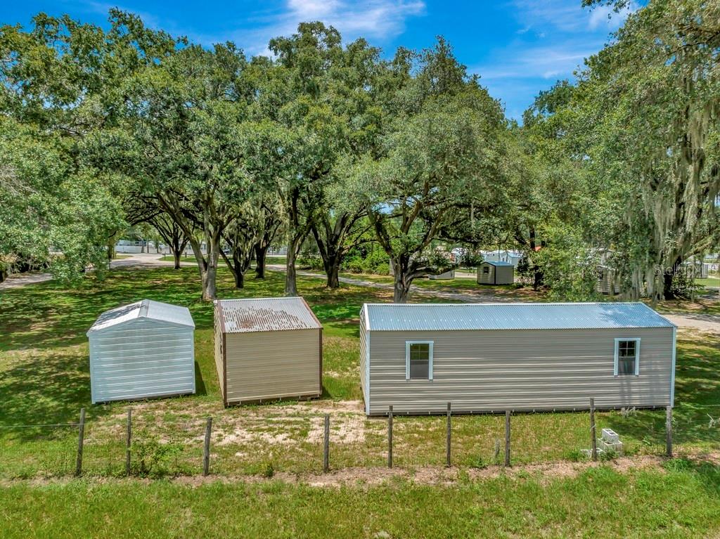 13285 Highway 92 Dover, FL 33527 - Photo 41 of 76 a backyard of a house with yard and outdoor seating