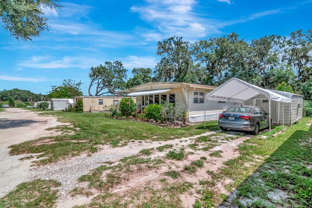 13285 Highway 92 Dover, FL 33527 - Photo 52 of 76 a house view with a garden space