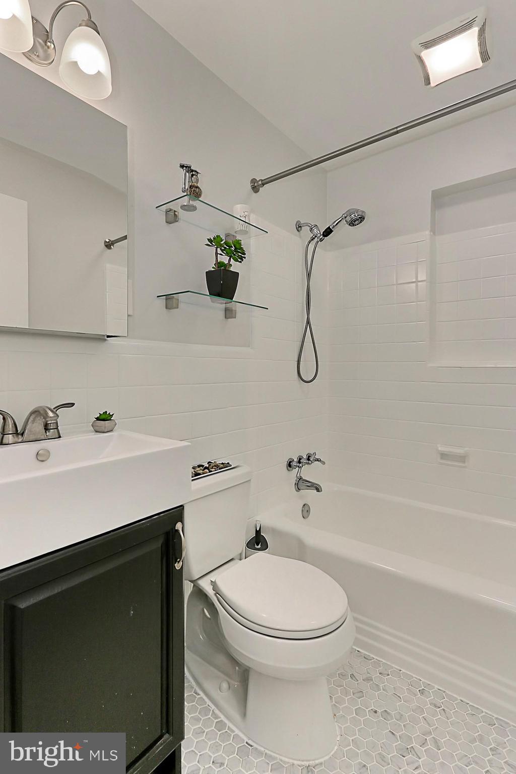 5906 Craig Street Springfield, VA 22150 - Photo 25 of 54 Updated hall bathroom