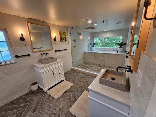 a room with furniture a window and a flat screen tv