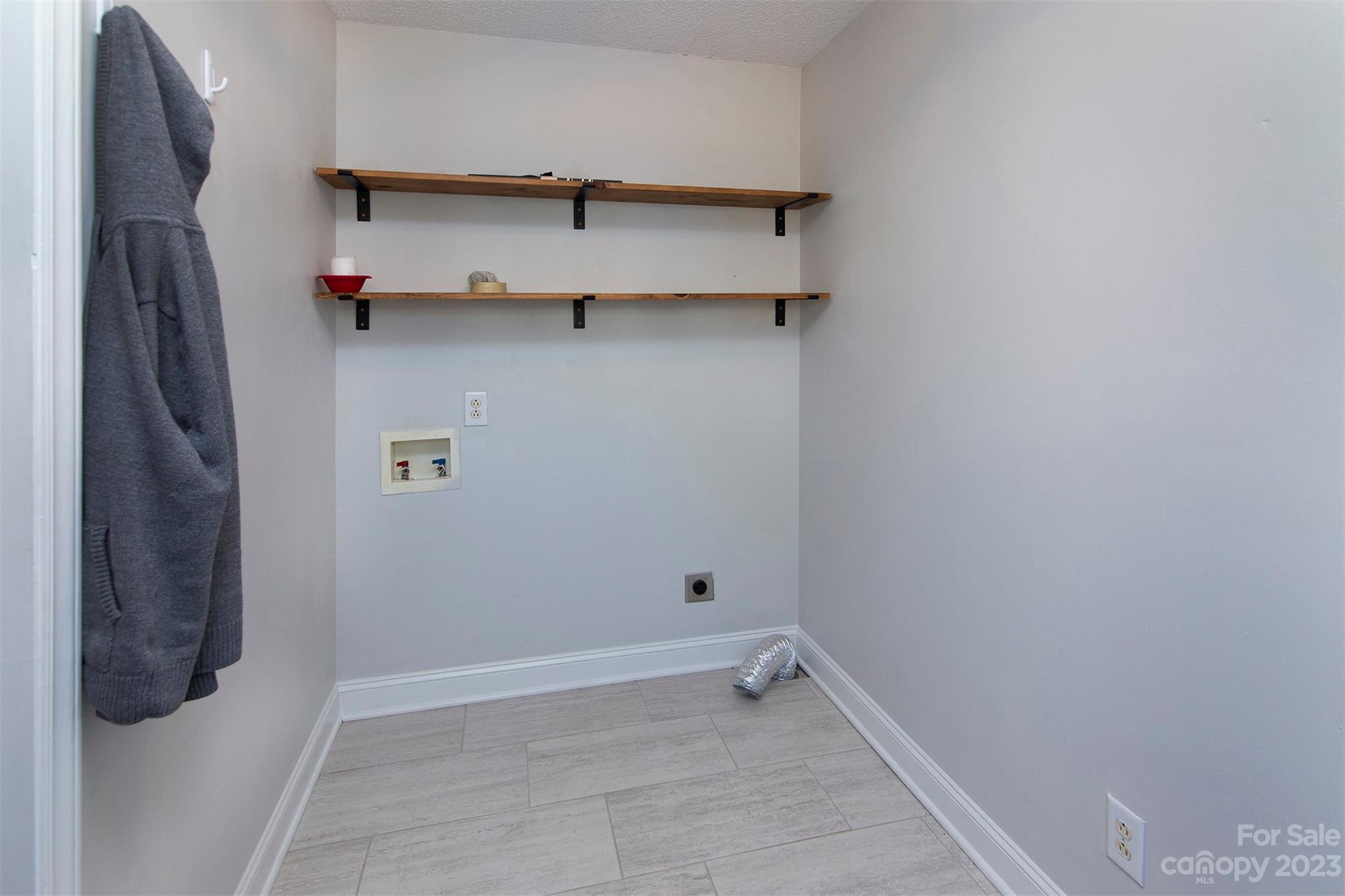 210 Church Street Locust, NC 28097 - Photo 13 of 22 a view of room with cabinets