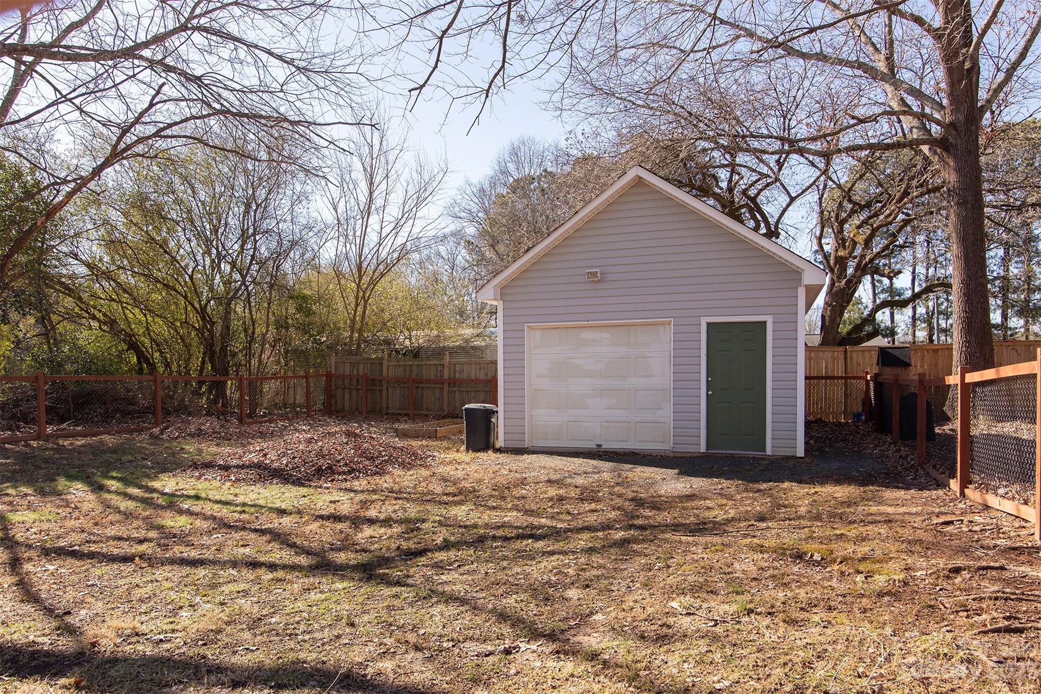 210 Church Street Locust, NC 28097 - Photo 21 of 22 a view of a house with a yard covered with snow