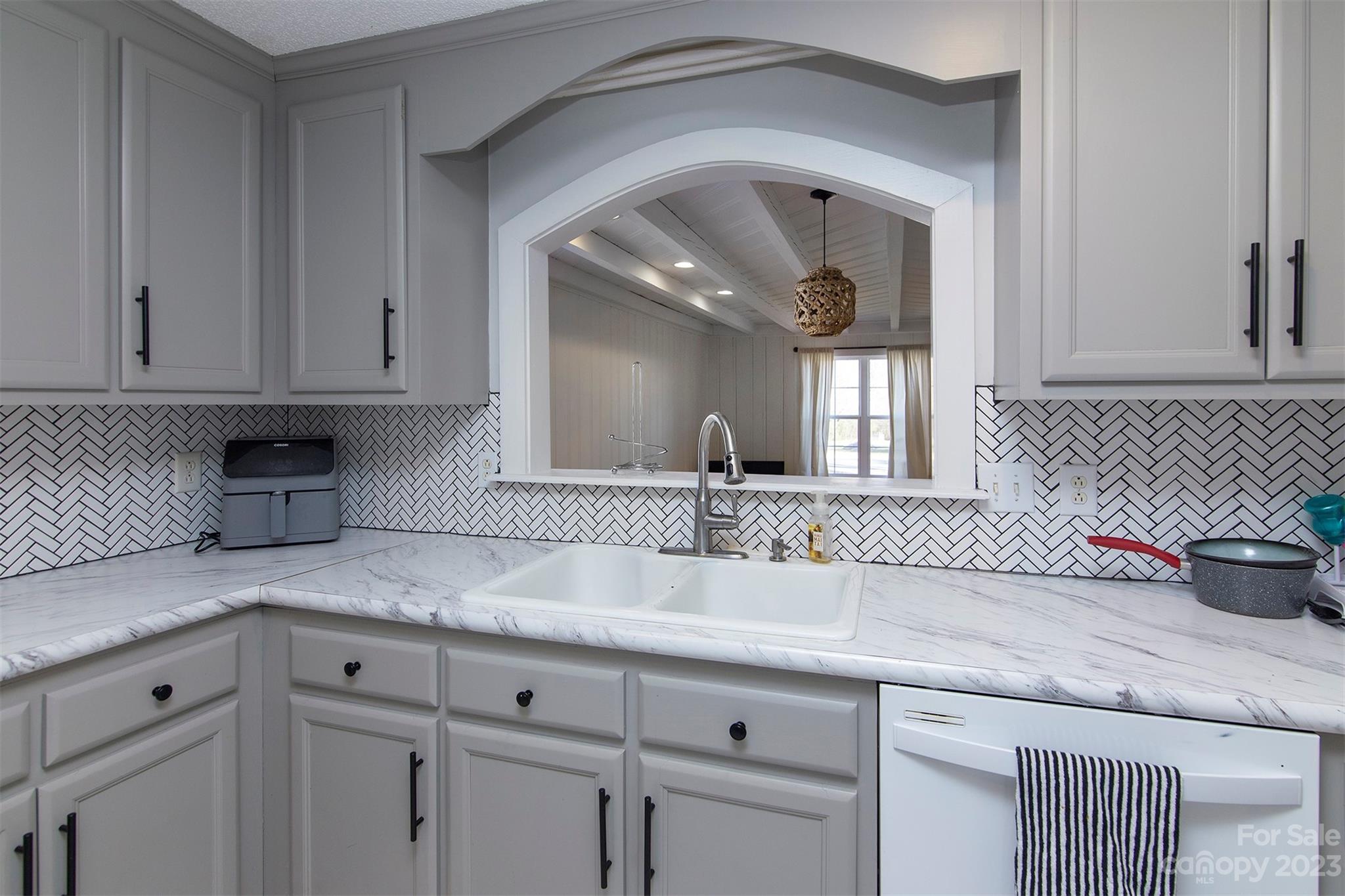 210 Church Street Locust, NC 28097 - Photo 6 of 22 a kitchen with sink and cabinets