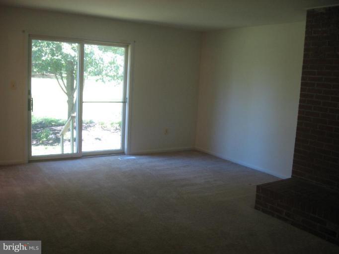 4902 Sweet Air Road Baldwin, MD 21013 - Photo 12 of 18 Family room with slider door to backyard