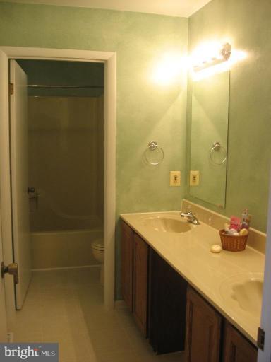 4902 Sweet Air Road Baldwin, MD 21013 - Photo 13 of 18 hallway full bathroom dual vanity sink, new fls.