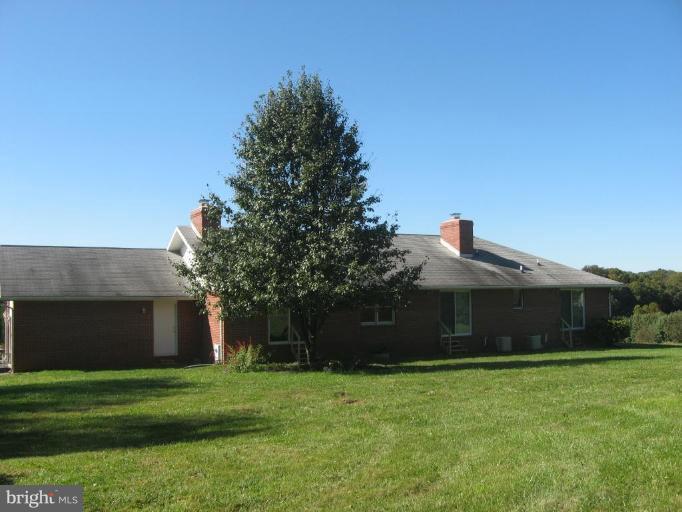 4902 Sweet Air Road Baldwin, MD 21013 - Photo 17 of 18 private flat backyard. Rear enterance to garage.