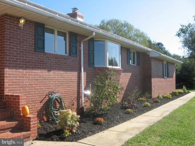 4902 Sweet Air Road Baldwin, MD 21013 - Photo 3 of 18 Low maintainance gardens front walk way.