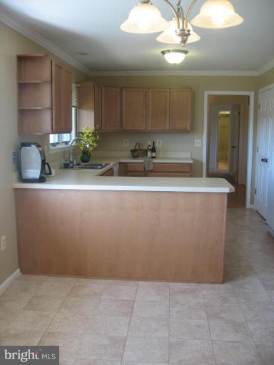 4902 Sweet Air Road Baldwin, MD 21013 - Photo 10 of 18 Plenty of room for kitchen table new laminate fls.