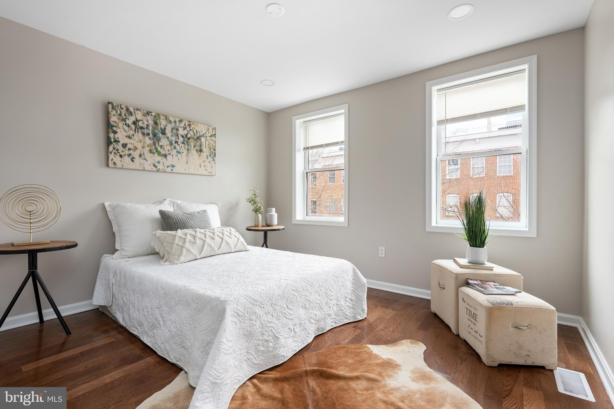 1358 Towson Street Baltimore, MD 21230 - Photo 16 of 39 a bedroom with two beds and a window