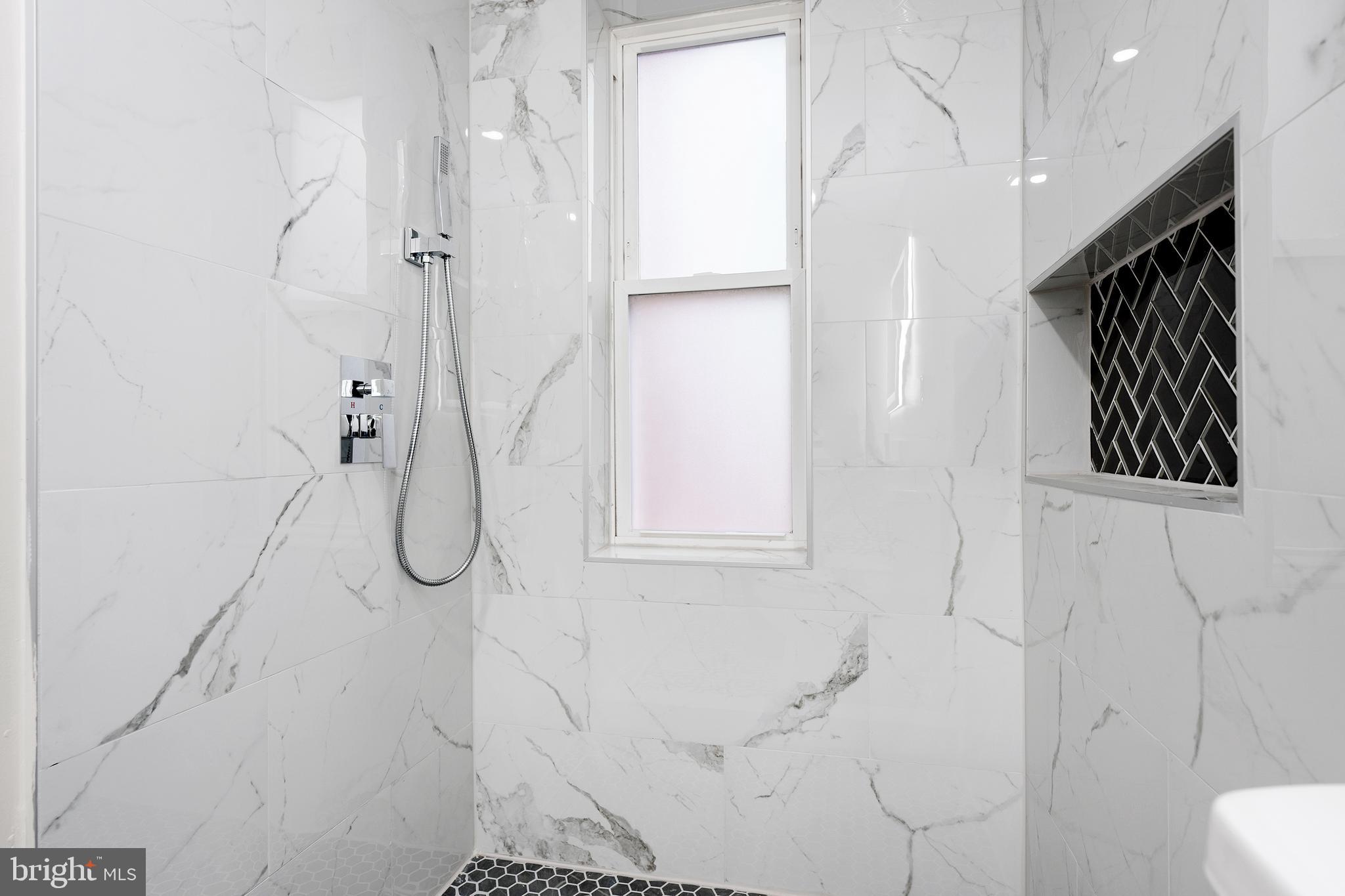 1358 Towson Street Baltimore, MD 21230 - Photo 21 of 39 a bathroom with a shower