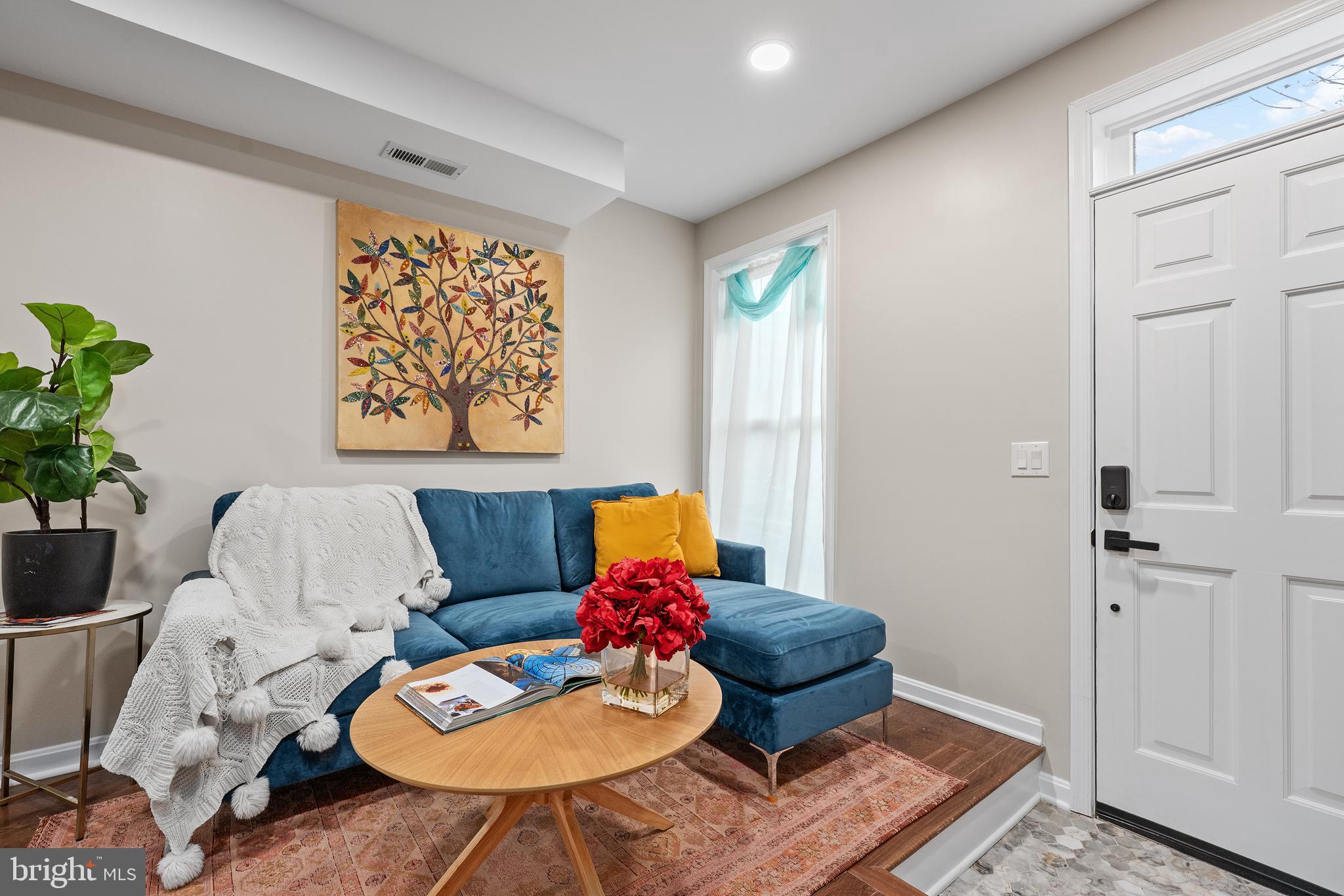 1358 Towson Street Baltimore, MD 21230 - Photo 3 of 39 a living room with furniture and wooden floor