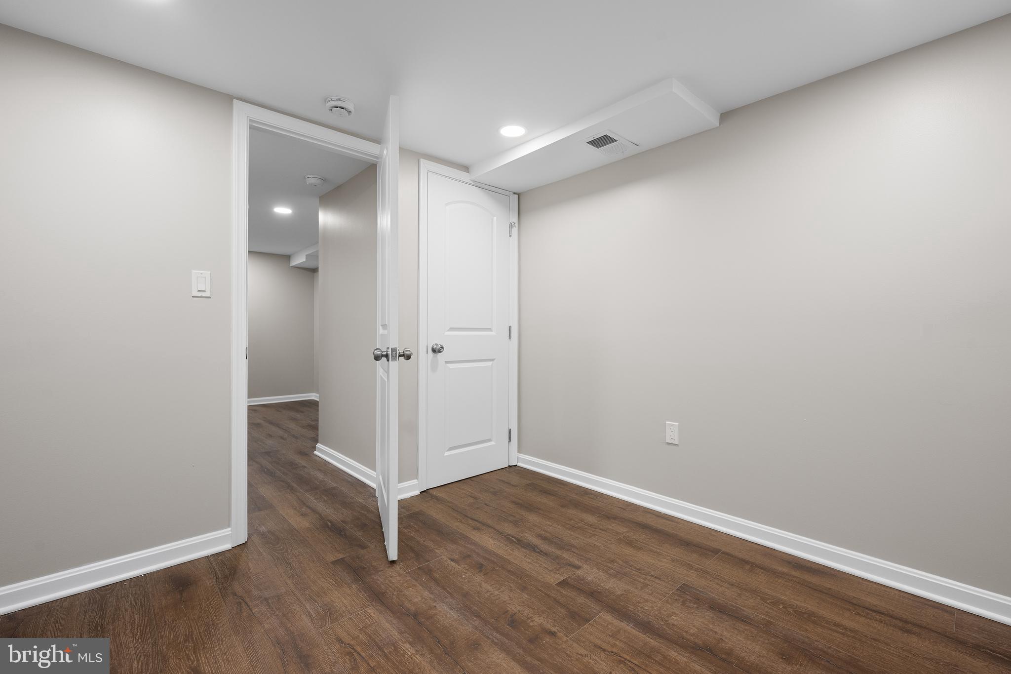 1358 Towson Street Baltimore, MD 21230 - Photo 35 of 39 wooden floor in an empty room
