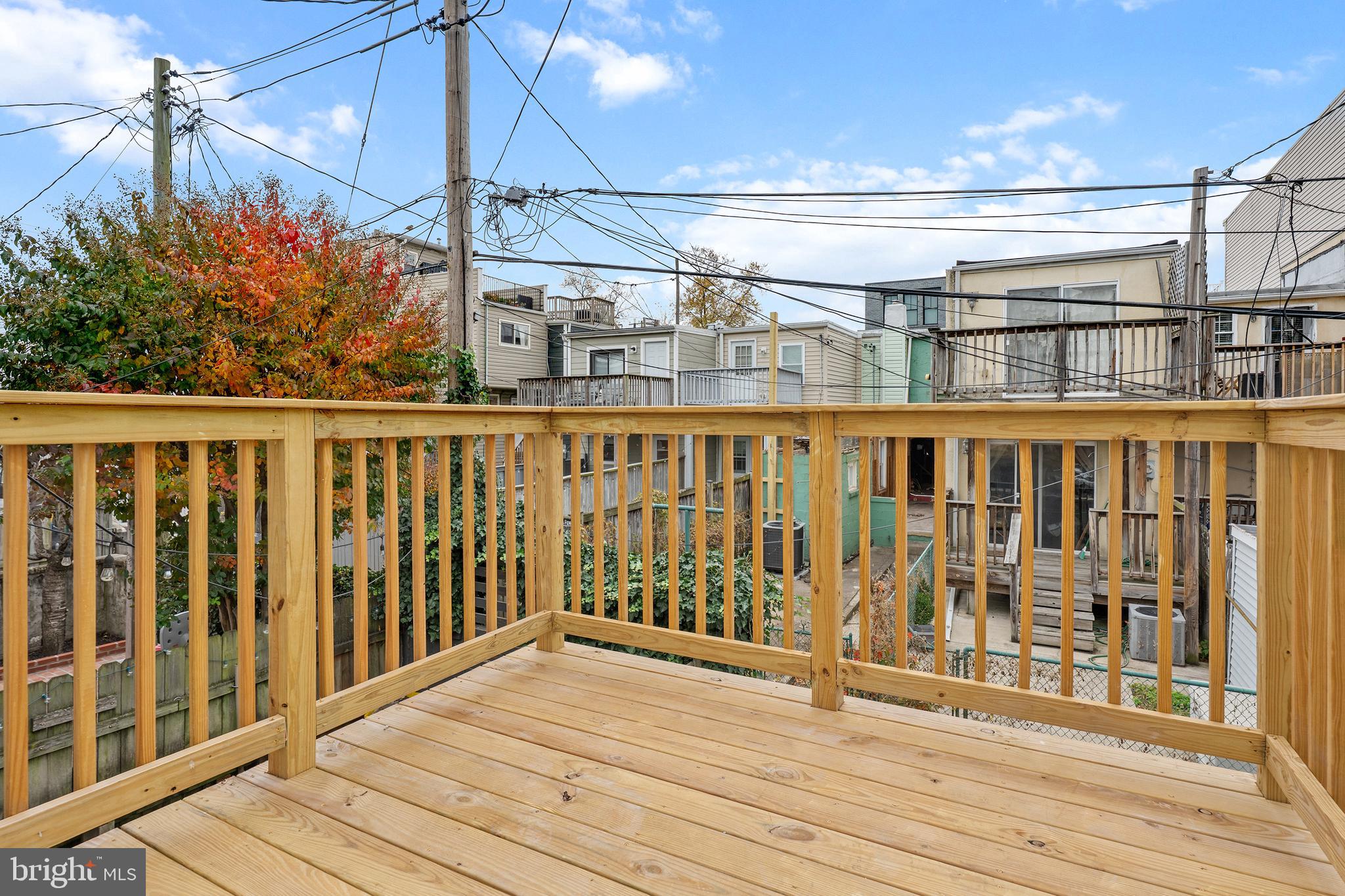1358 Towson Street Baltimore, MD 21230 - Photo 37 of 39 a view of a balcony with wooden floor