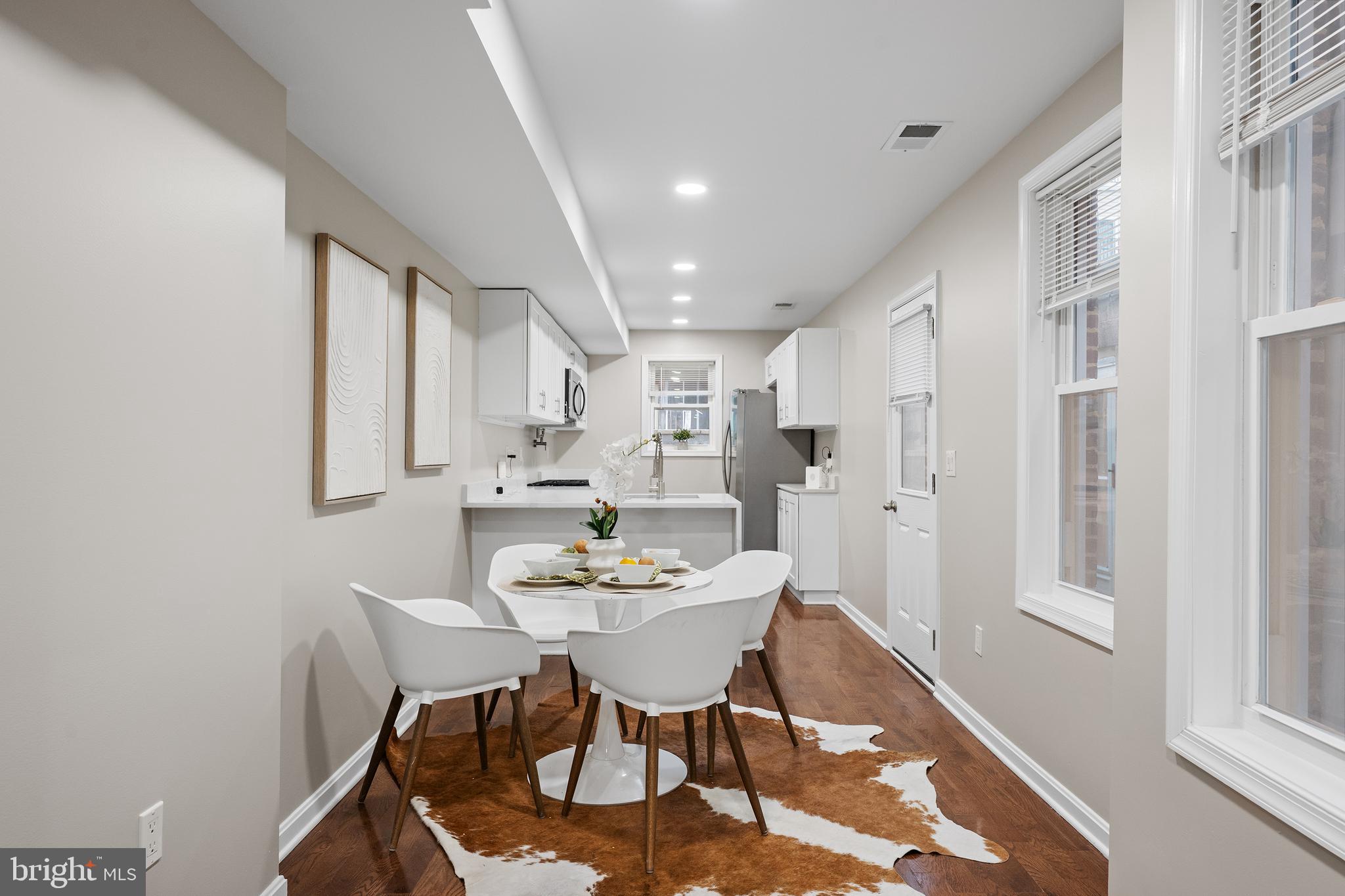1358 Towson Street Baltimore, MD 21230 - Photo 6 of 39 a view of a dining room with furniture