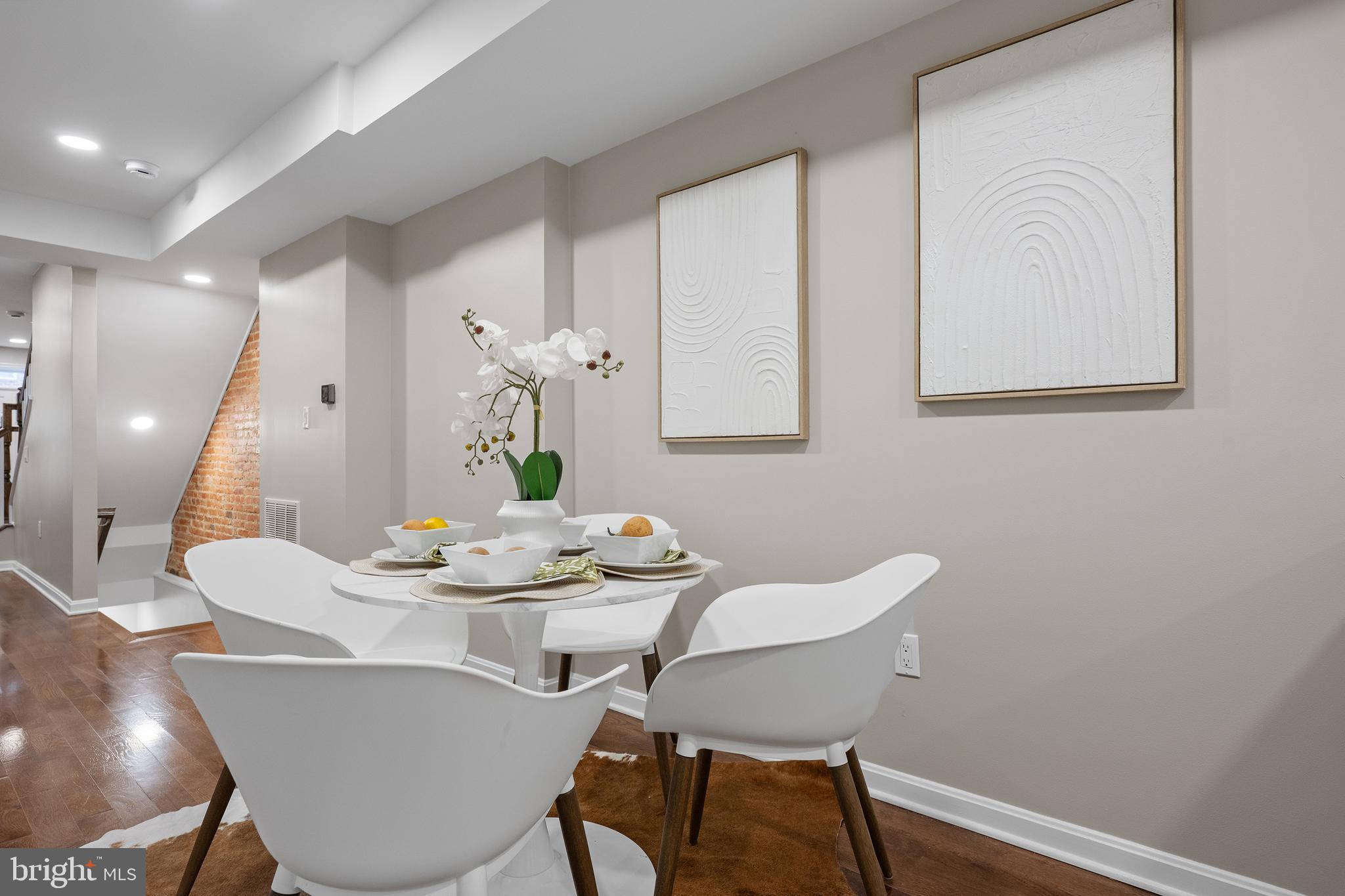 1358 Towson Street Baltimore, MD 21230 - Photo 8 of 39 a dining room with furniture and wooden floor