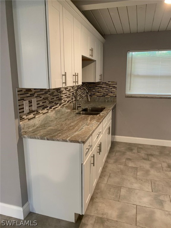 4513 Luckett Road Fort Myers, FL 33905 - Photo 8 of 20 a kitchen with granite countertop a sink and a stove
