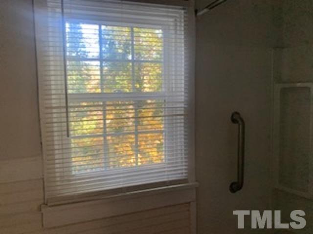 1704 Robinhood Road Durham, NC 27701 - Photo 11 of 18 a bathroom with a window