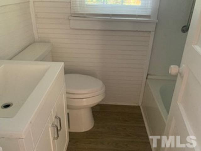 1704 Robinhood Road Durham, NC 27701 - Photo 12 of 18 a bathroom with a toilet and a shower