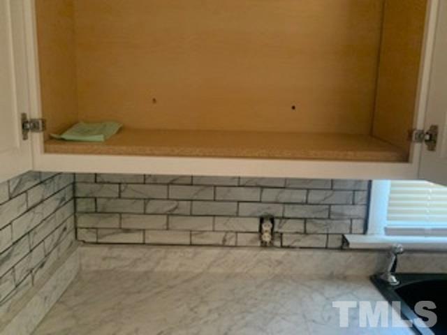 1704 Robinhood Road Durham, NC 27701 - Photo 15 of 18 a bathroom with a bathtub