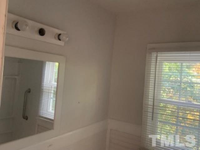 1704 Robinhood Road Durham, NC 27701 - Photo 9 of 18 a bathroom with a bathtub and shower