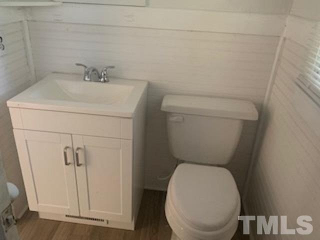 1704 Robinhood Road Durham, NC 27701 - Photo 10 of 18 a bathroom with a toilet and a sink
