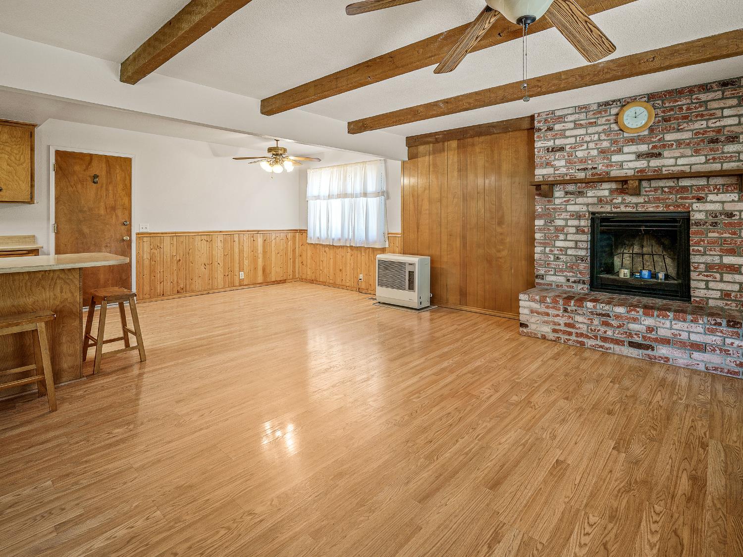 3591 Cambridge Road Cameron Park, CA 95682 - Photo 10 of 22 Family Room photo with Dining room off of Kitchen. Home features a Kerosene Heater as an additional heat source.