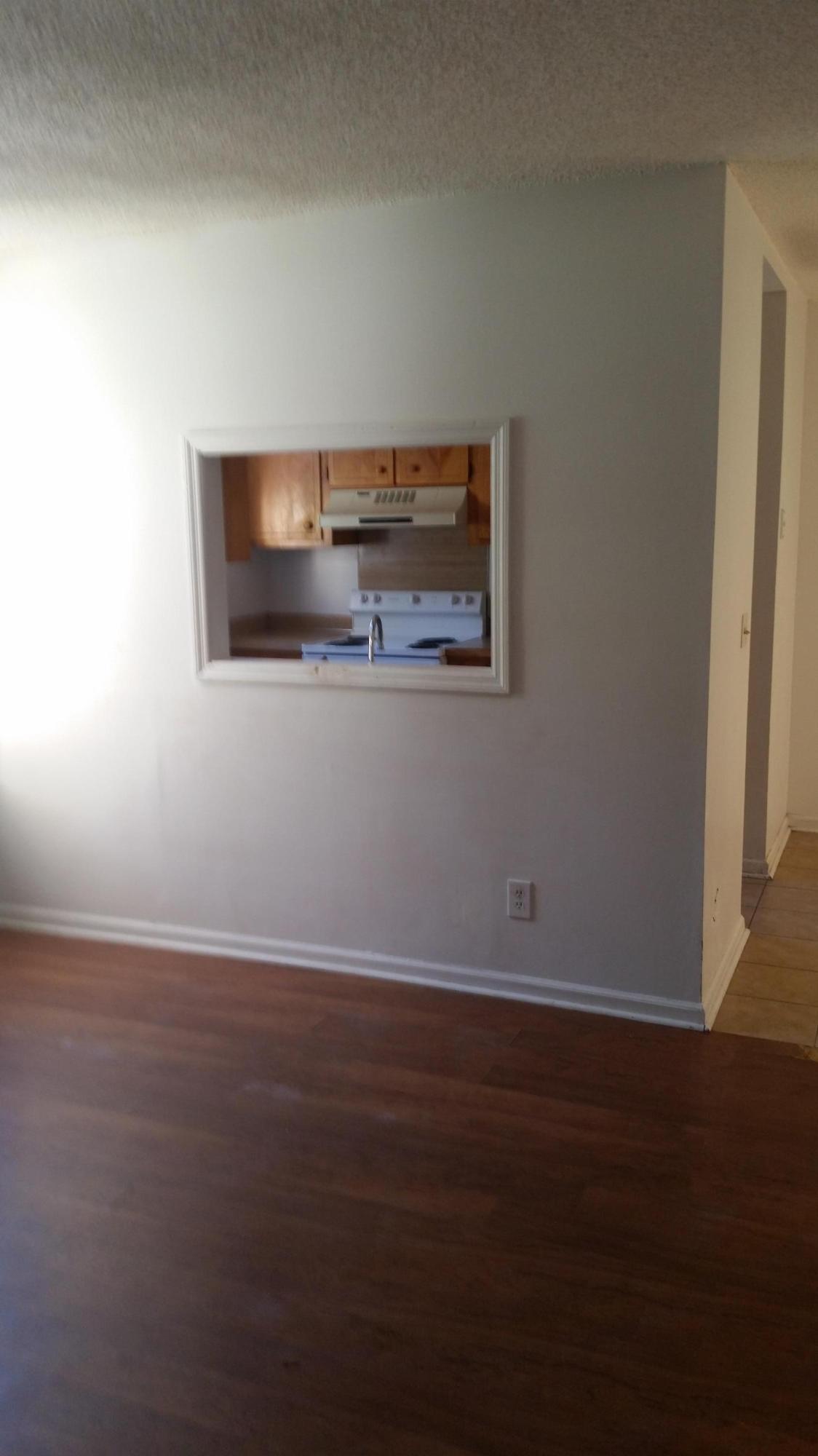 72 Burnt Mills Road, Unit A & B Goose Creek, SC 29445 - Photo 11 of 18 cutout between kitchen and living room