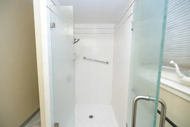 a room with a bed and a desk