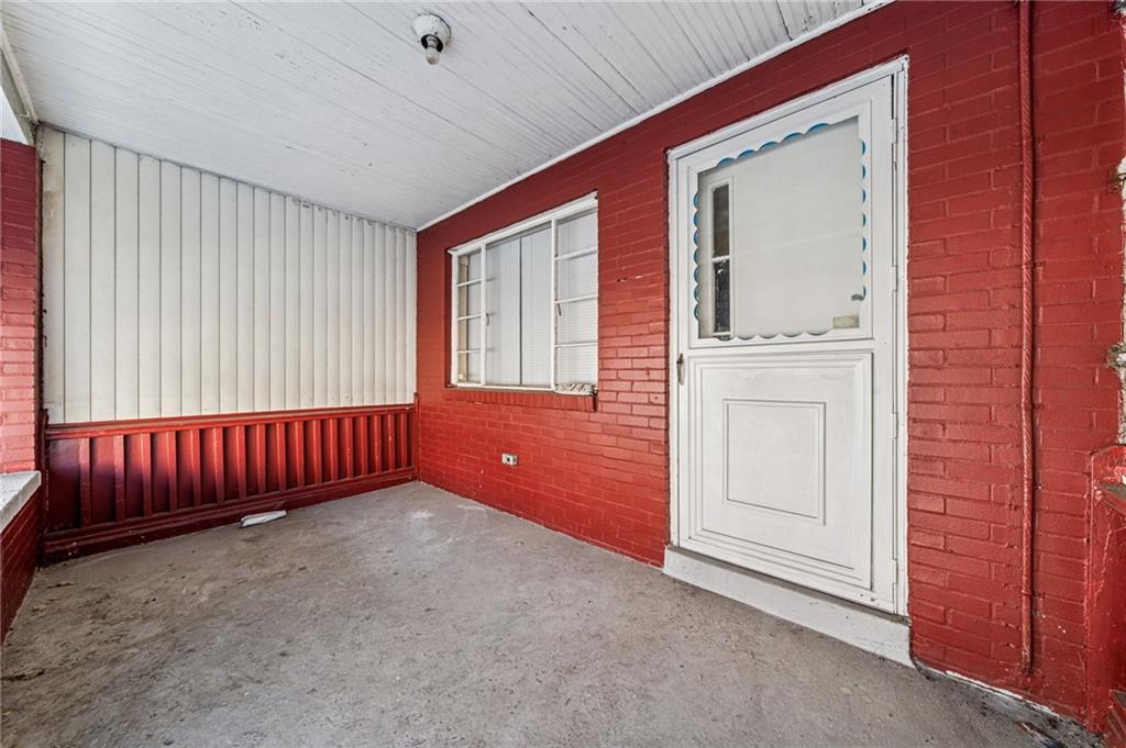 214 Fleet Street Braddock, PA 15104 - Photo 26 of 31 a view of an empty room with a window