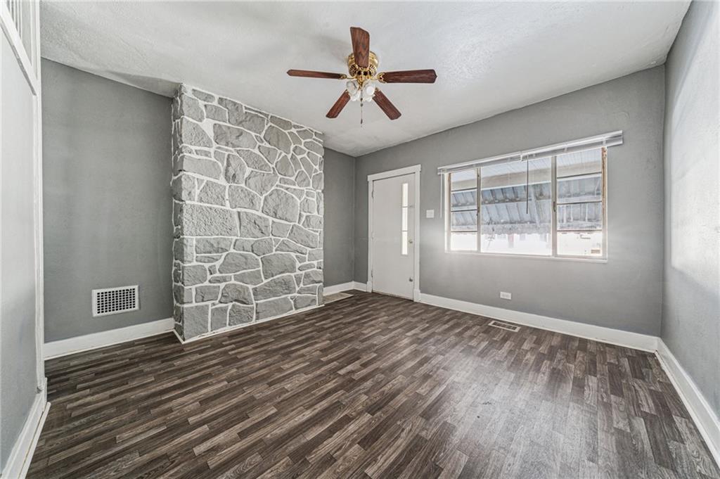 214 Fleet Street Braddock, PA 15104 - Photo 4 of 31 a view of an empty room with a window