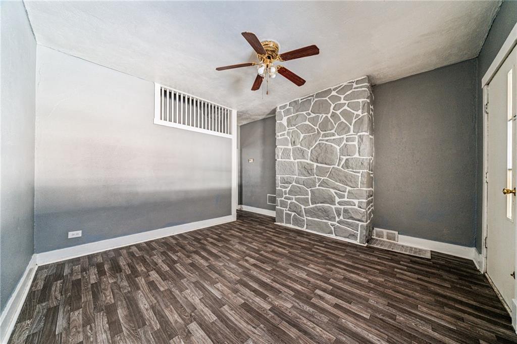 214 Fleet Street Braddock, PA 15104 - Photo 5 of 31 a view of an empty room with a window