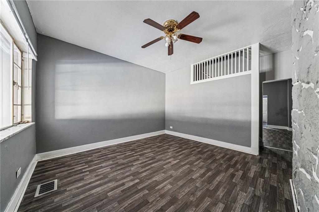 214 Fleet Street Braddock, PA 15104 - Photo 6 of 31 a view of an empty room with a window