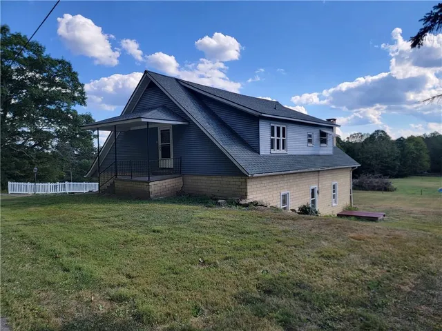a house view with a garden space