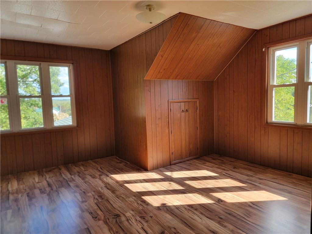 1480 Pollock Road Rossiter, PA 15772 - Photo 18 of 32 an empty room with wooden floor and windows