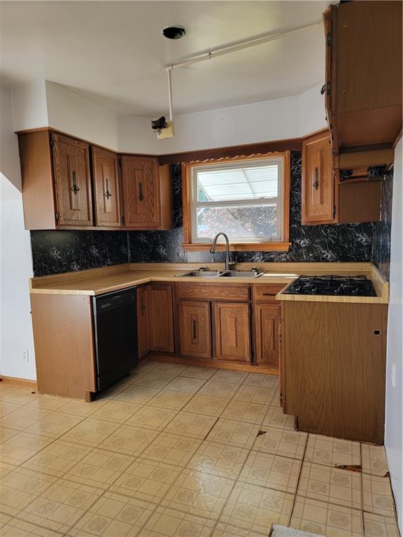 1480 Pollock Road Rossiter, PA 15772 - Photo 20 of 32 a kitchen with stainless steel appliances granite countertop a sink counter space cabinets and a window
