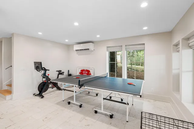 a bathroom with a double vanity sink and a bathtub