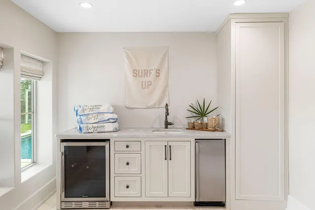 a view of deck with wooden floor and floor to ceiling window