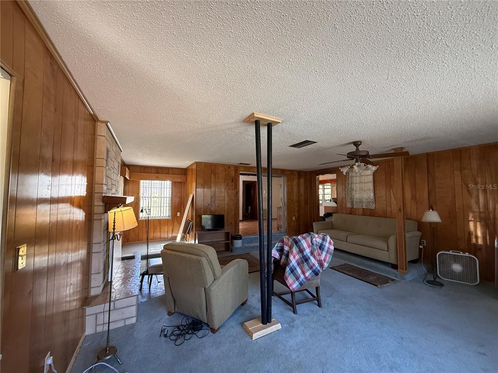 2200 Butler Street Leesburg, FL 34748 - Photo 13 of 32 a living room with furniture and a window
