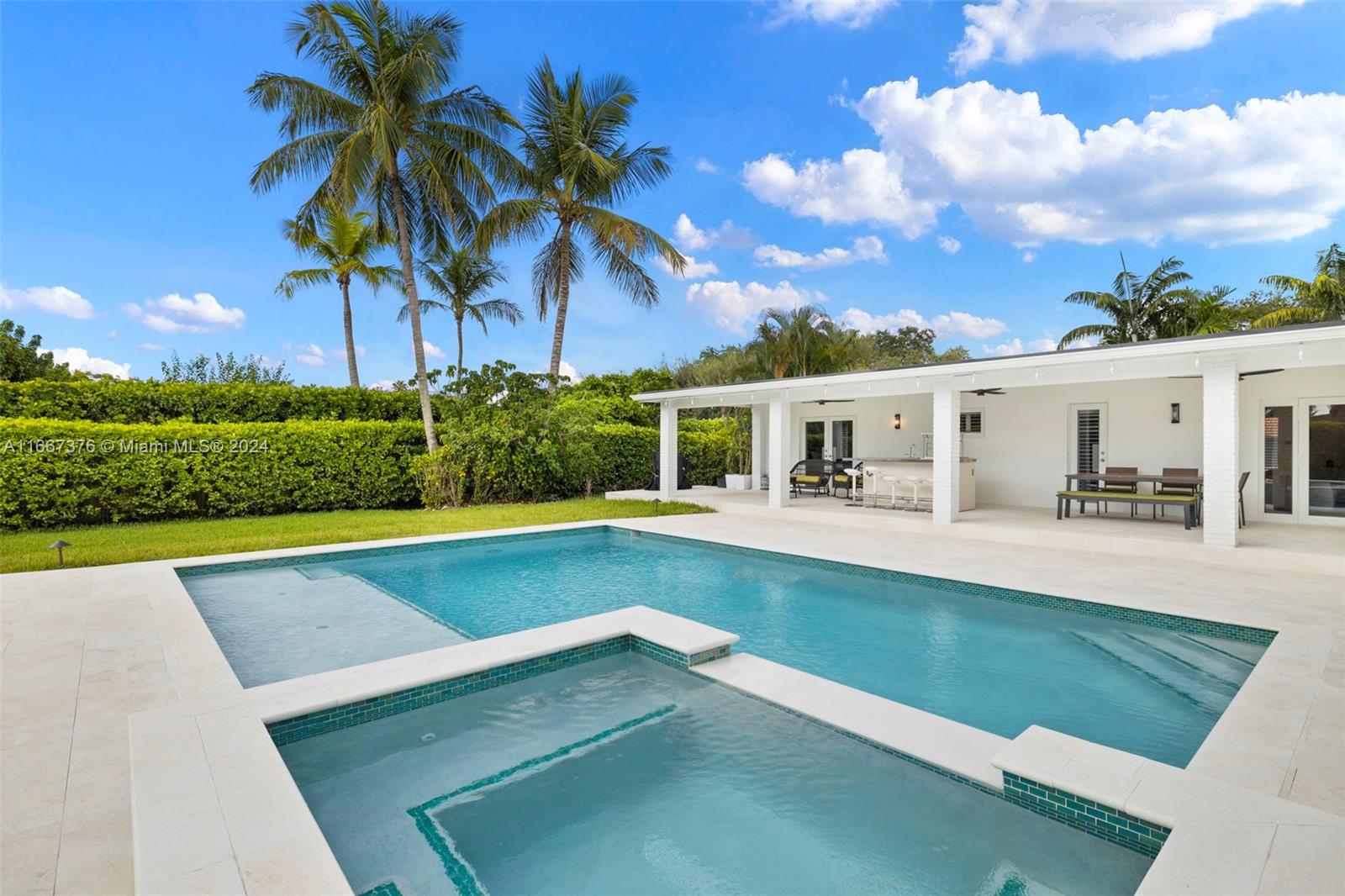 10005 Southwest 79th Avenue Miami, FL 33156 - Photo 24 of 32 a view of house with swimming pool and a yard