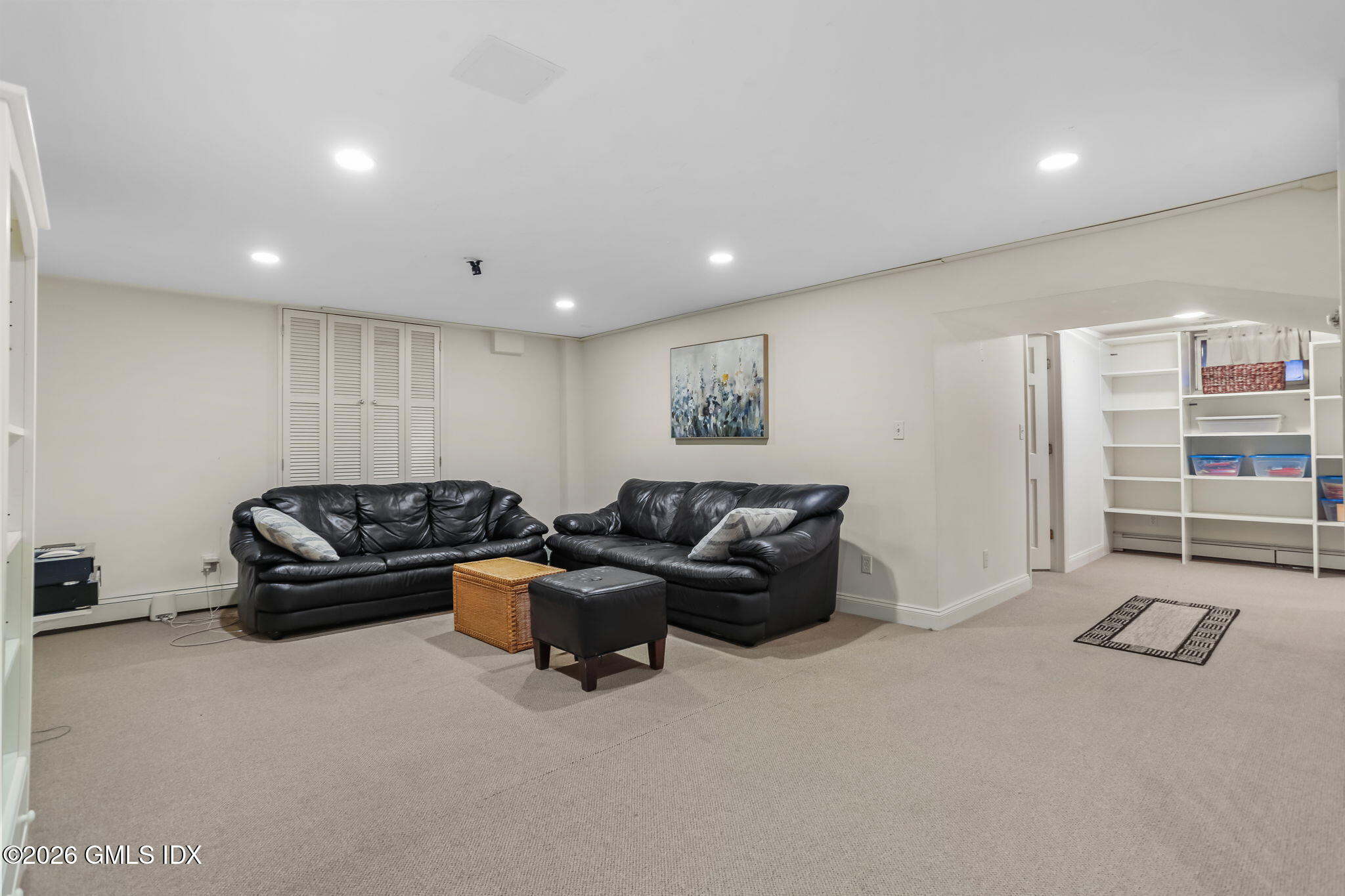 153 Lockwood Road Riverside, CT 06878 - Photo 40 of 58 a living room with furniture