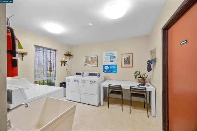 a workspace with furniture and window