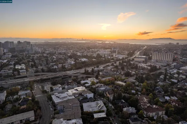an aerial view of residential house and green space