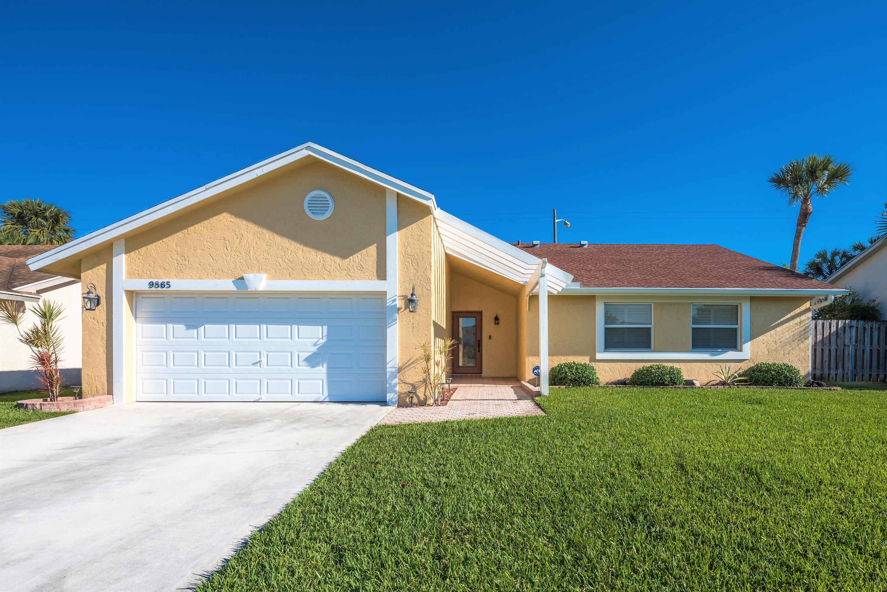 9865 Liberty Court Boca Raton, FL 33434 - Photo 1 of 47 front of house