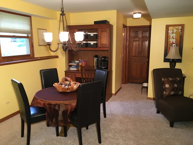 3496 Meadow Crest Circle Gurnee, IL 60031 - Photo 13 of 25 a dining room with furniture and window