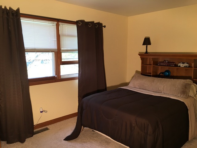 3496 Meadow Crest Circle Gurnee, IL 60031 - Photo 18 of 25 a bedroom with a bed and a window