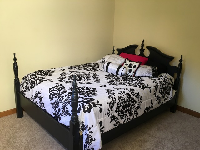 3496 Meadow Crest Circle Gurnee, IL 60031 - Photo 19 of 25 a bed sitting in a bedroom next to a window