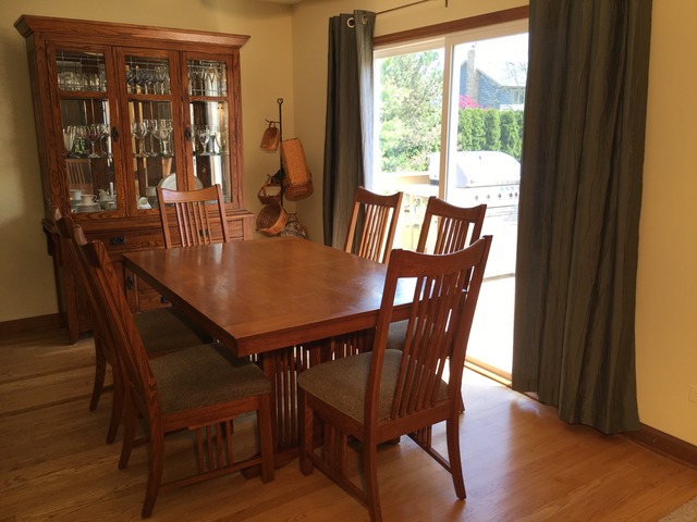 3496 Meadow Crest Circle Gurnee, IL 60031 - Photo 6 of 25 a view of a dining room with furniture window and wooden floor