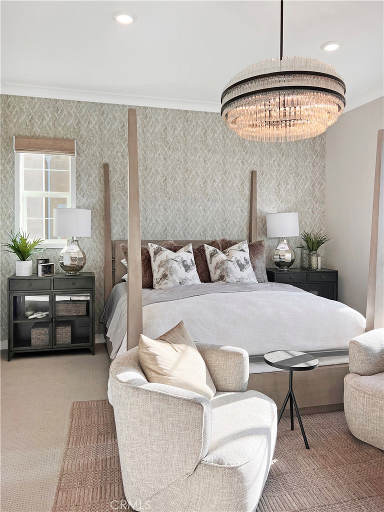 27105 Trail View Ln. Valencia, CA 91381 - Photo 12 of 30 a bedroom with a bed and a chandelier