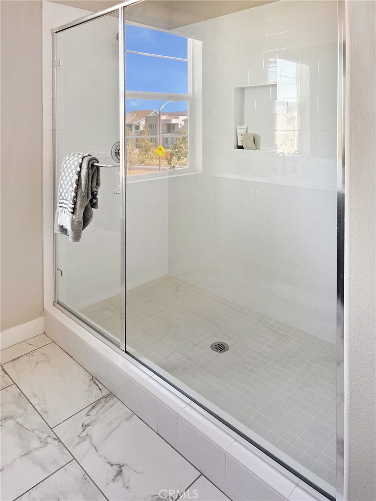 27105 Trail View Ln. Valencia, CA 91381 - Photo 16 of 30 a bathroom with a shower