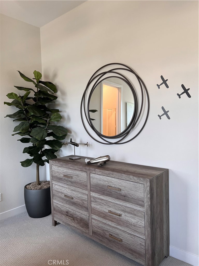 27105 Trail View Ln. Valencia, CA 91381 - Photo 24 of 30 a vase of flowers sitting on a table